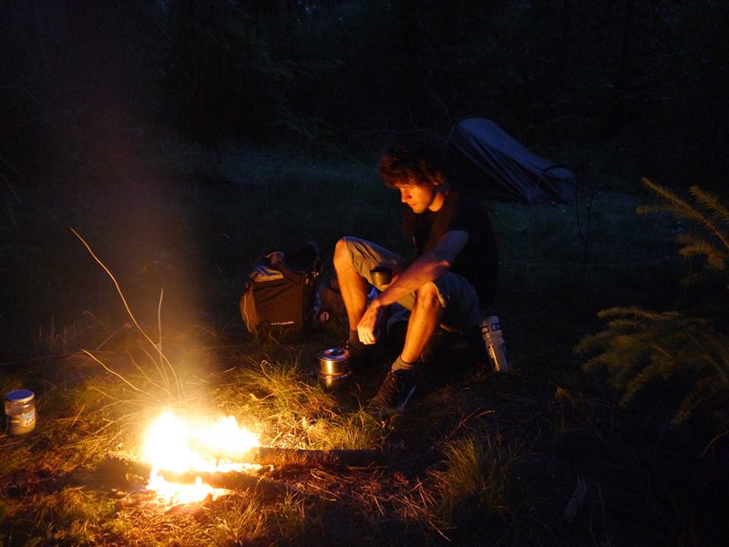 Relaxing by a fire at the border between Belgium and the Netherlands