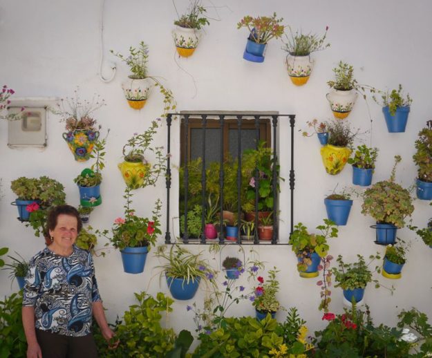 Spanish lady with her plants