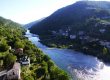 a river flowing through the hills in Galicia