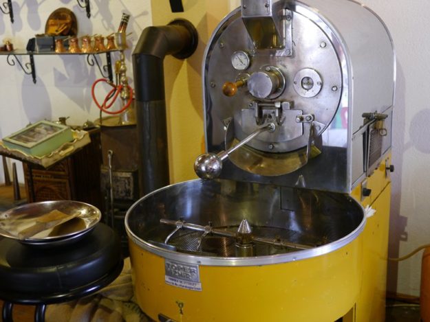 A yellow coffee roasting machine from the 60's