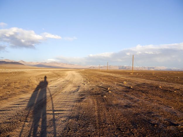 shadows drown out cycling Kulma Pass the plateau before Kulma Pass