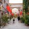 Fake paved roads, concret and Chinese flags in Kashgar