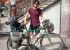 Jamie with his bicycle